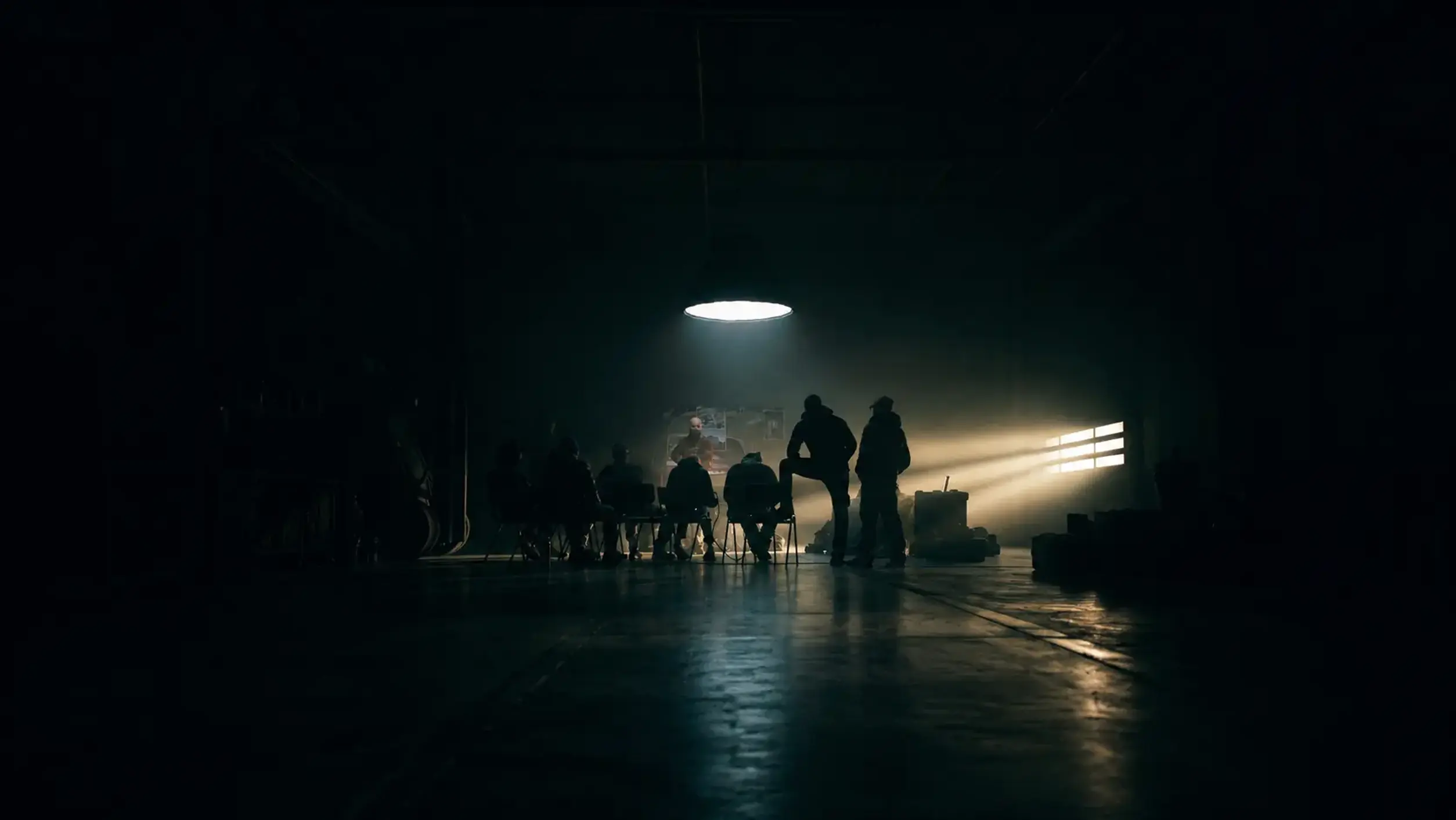 Cinematic tactical briefing staged inside a dark hangar
